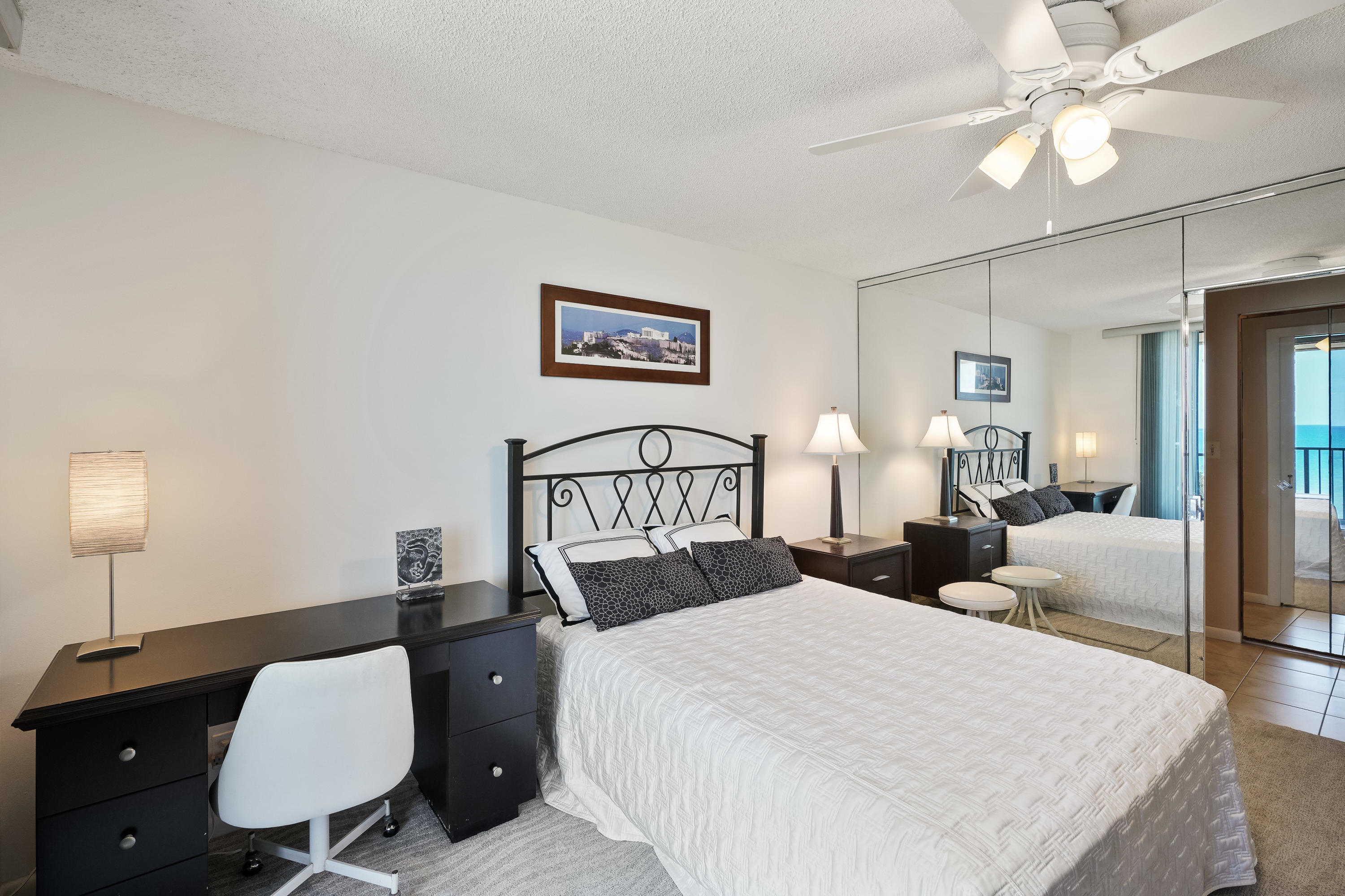 200 Ocean Trail Way, Unit 708 Jupiter, FL 33477 - Photo 19 of 23 a bed room with a bed and chair