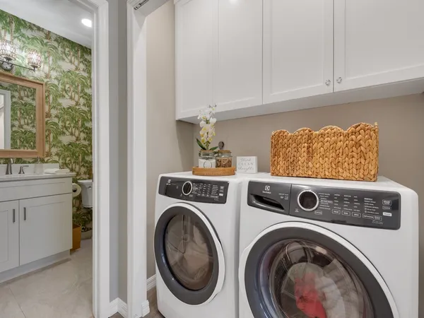 a utility room with dryer and washer