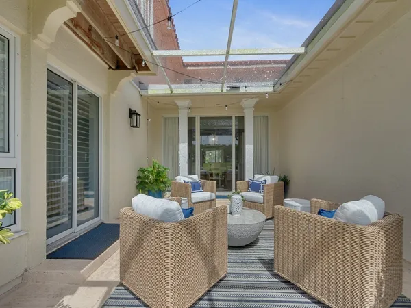 a balcony with furniture