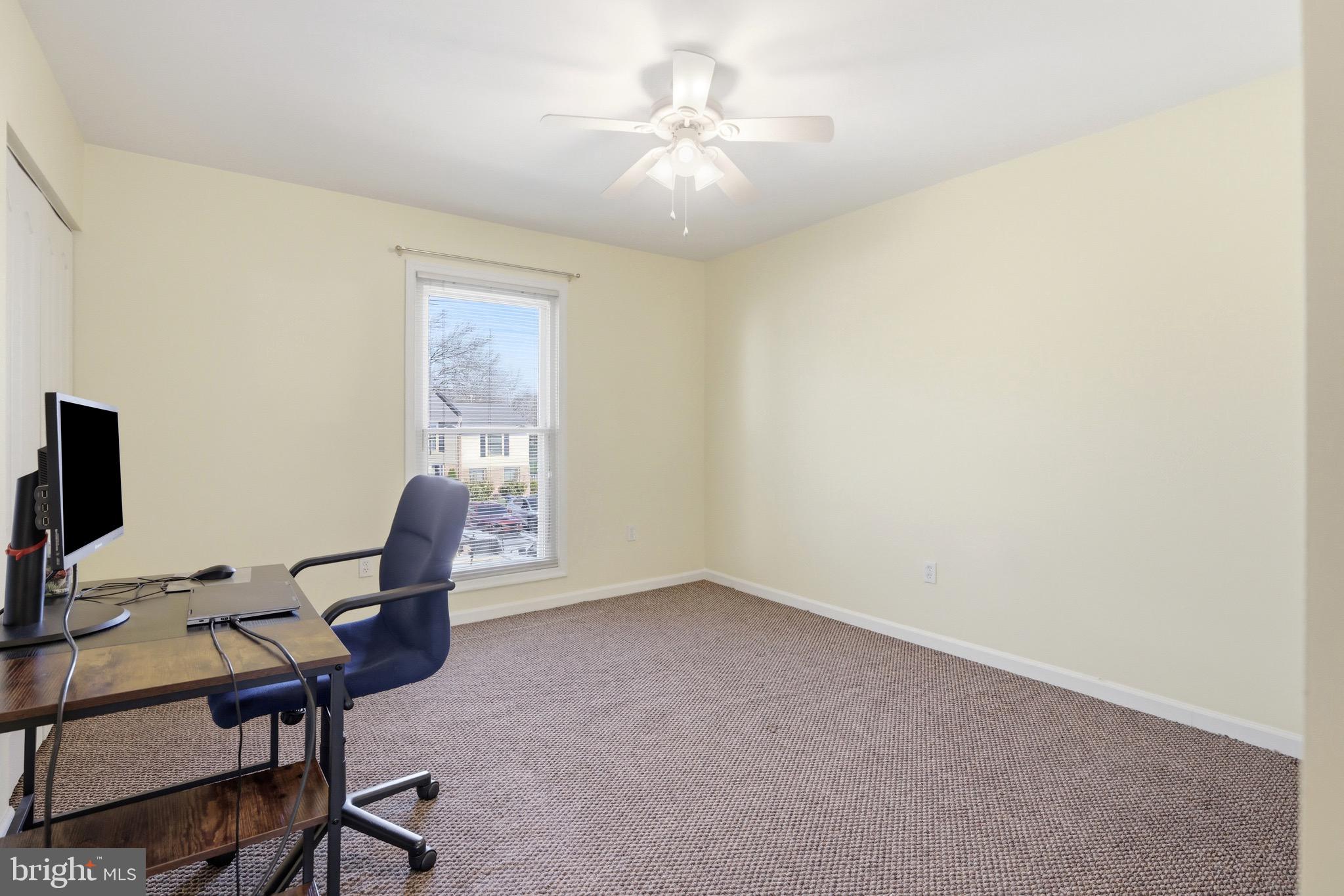 11506 Laurelwalk Drive Laurel, MD 20708 - Photo 23 of 30 a view of a workspace with furniture and a window