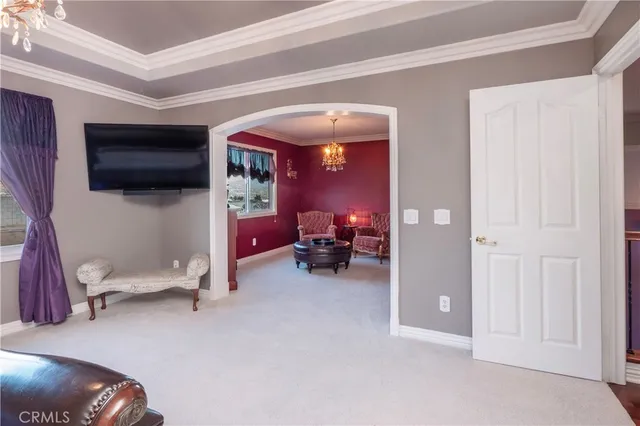 a spacious bathroom with a large tub shower and window