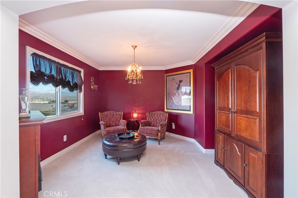 20642 Iris Canyon Road Riverside, CA 92508 - Photo 31 of 57 a dining room with furniture a chandelier and window