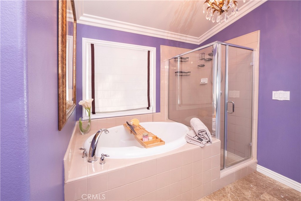 20642 Iris Canyon Road Riverside, CA 92508 - Photo 35 of 57 a bathroom with a tub sink and shower