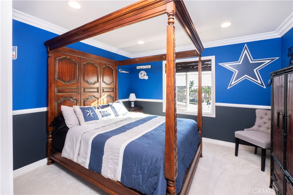 20642 Iris Canyon Road Riverside, CA 92508 - Photo 42 of 57 a bedroom with a bed and dresser with chair