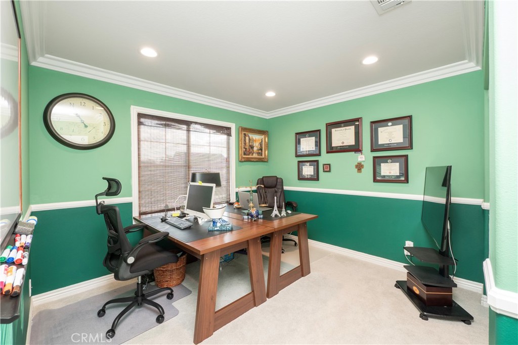 20642 Iris Canyon Road Riverside, CA 92508 - Photo 44 of 57 a view of a workspace with furniture and a window