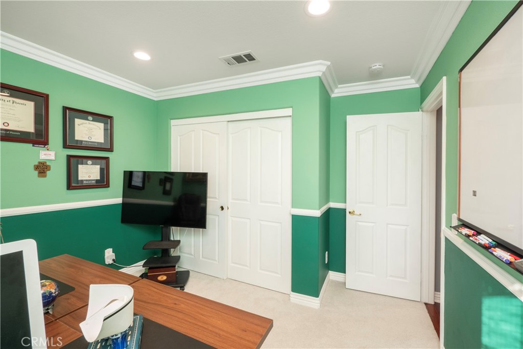 20642 Iris Canyon Road Riverside, CA 92508 - Photo 45 of 57 a living room with furniture and a flat screen tv