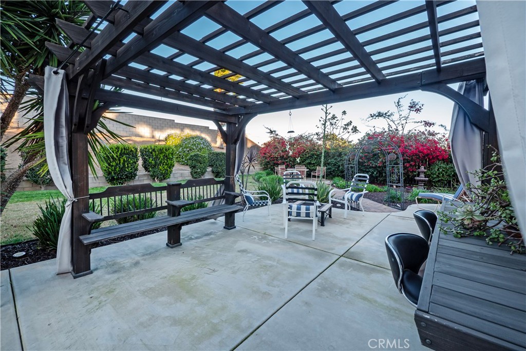 20642 Iris Canyon Road Riverside, CA 92508 - Photo 49 of 57 a view of a chairs and tables in the patio
