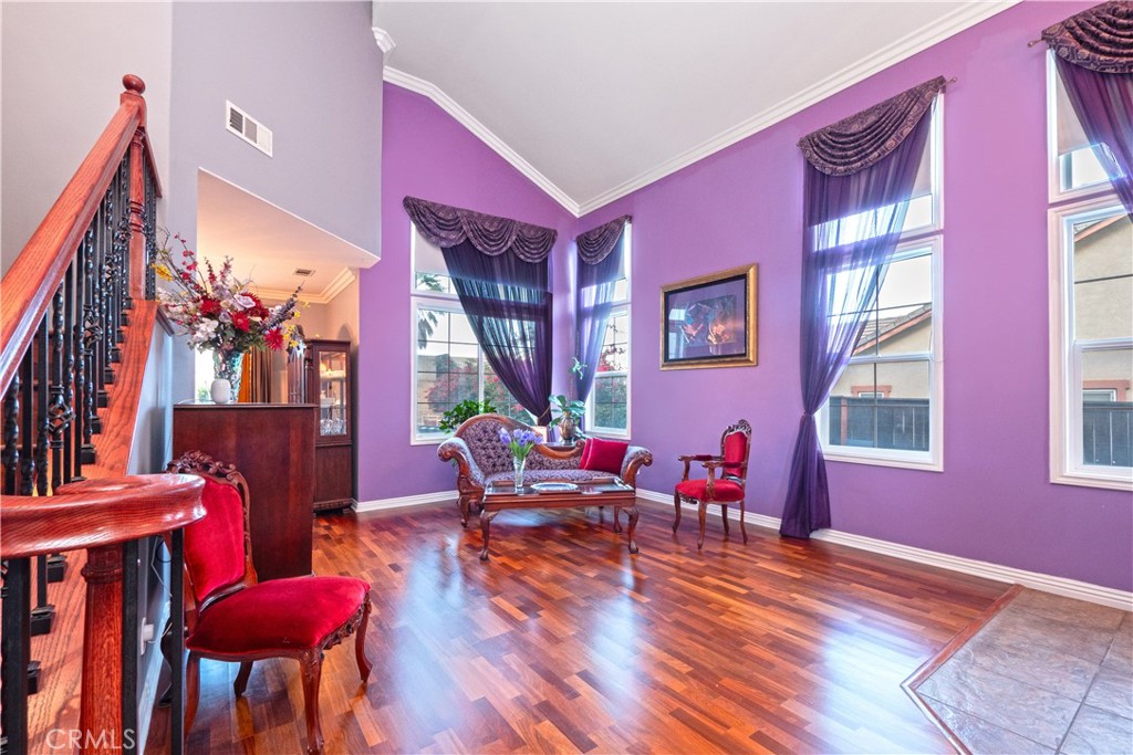 20642 Iris Canyon Road Riverside, CA 92508 - Photo 10 of 57 a living room with furniture a window and wooden floor