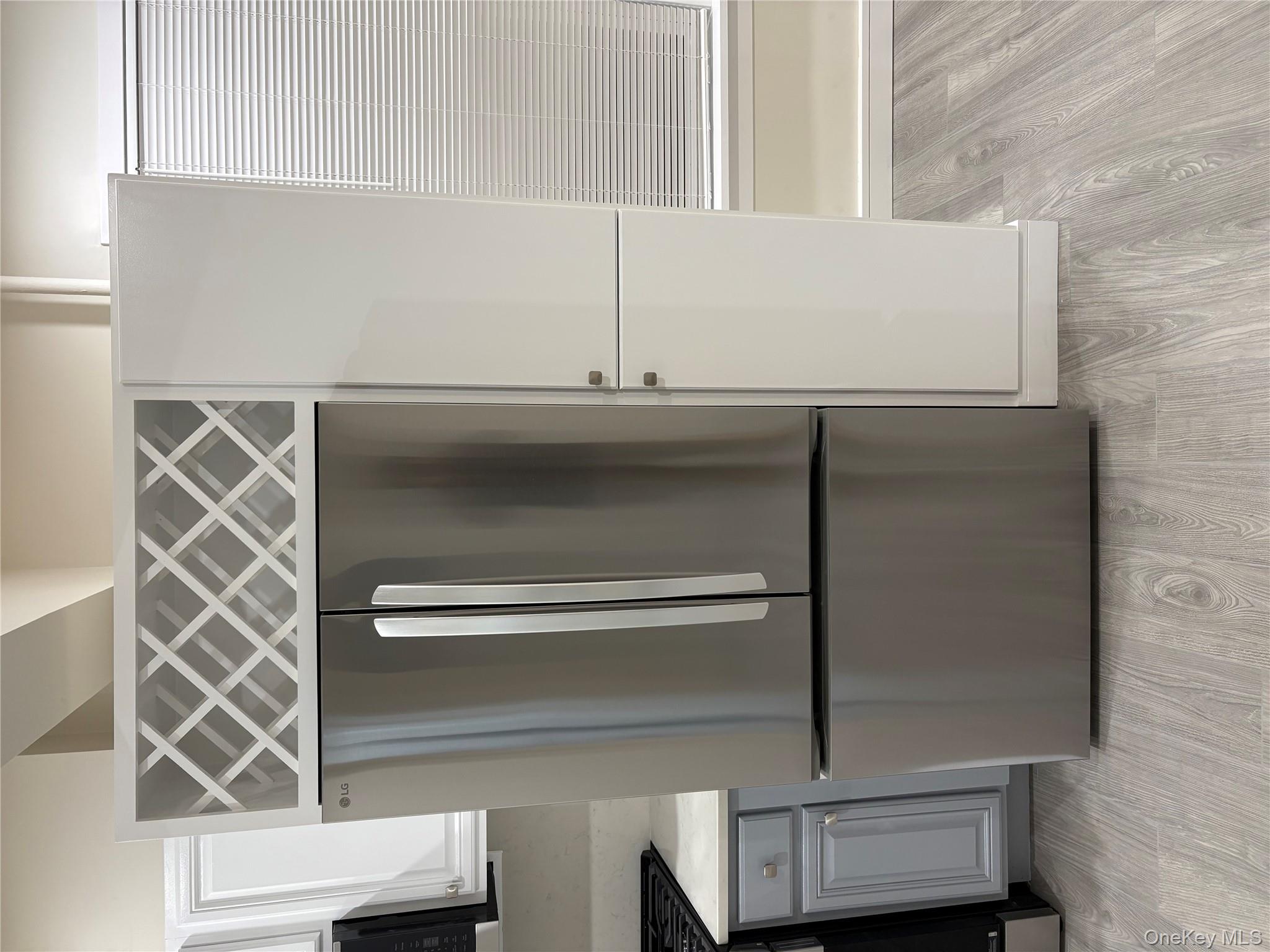 30-68 45th Street, Unit 1 Queens, NY 11103 - Photo 15 of 24 a kitchen with a refrigerator and a stove