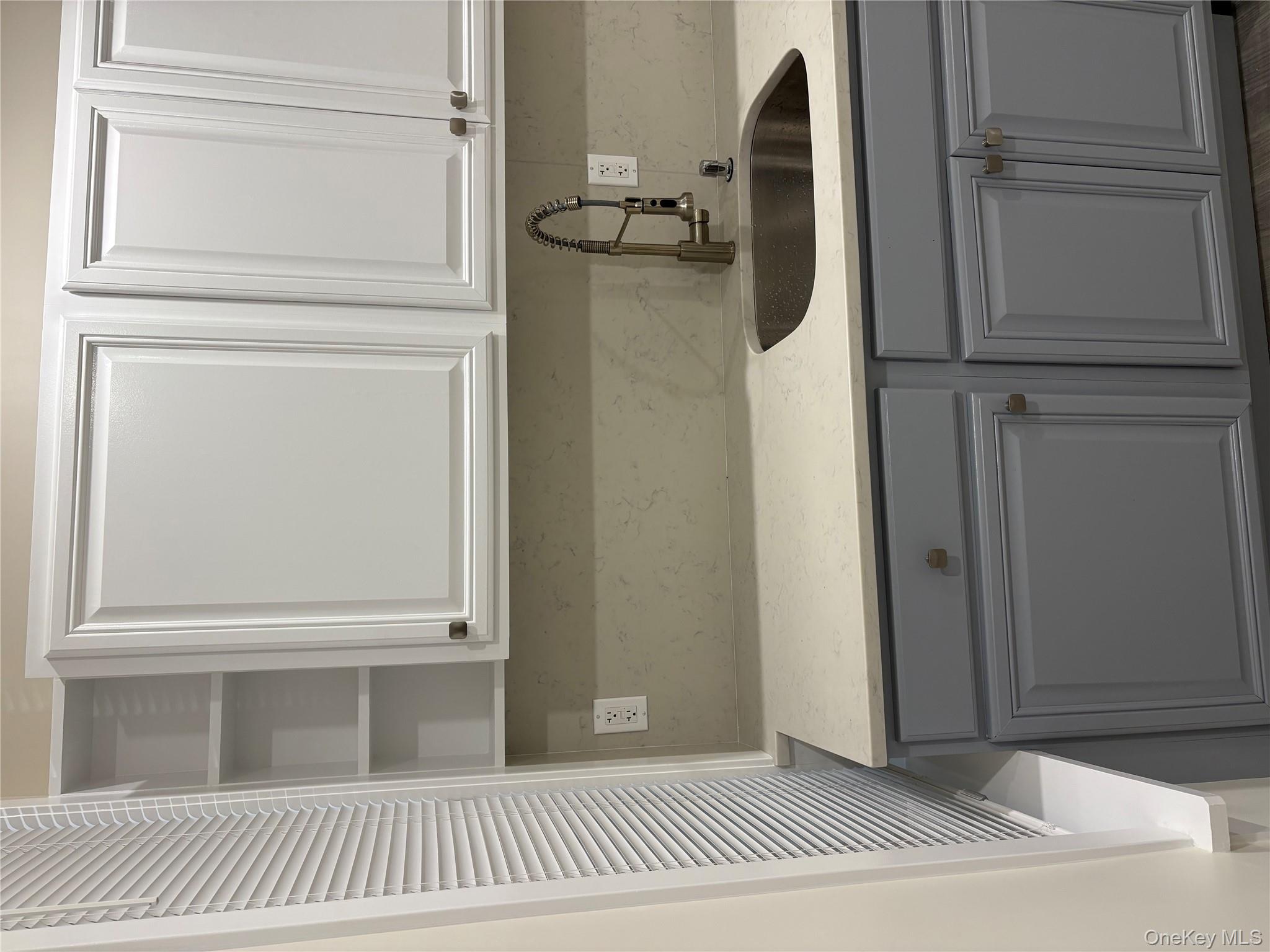 30-68 45th Street, Unit 1 Queens, NY 11103 - Photo 16 of 24 a close view of sink and cabinets