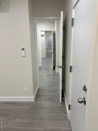 a view of a bathroom from the hallway