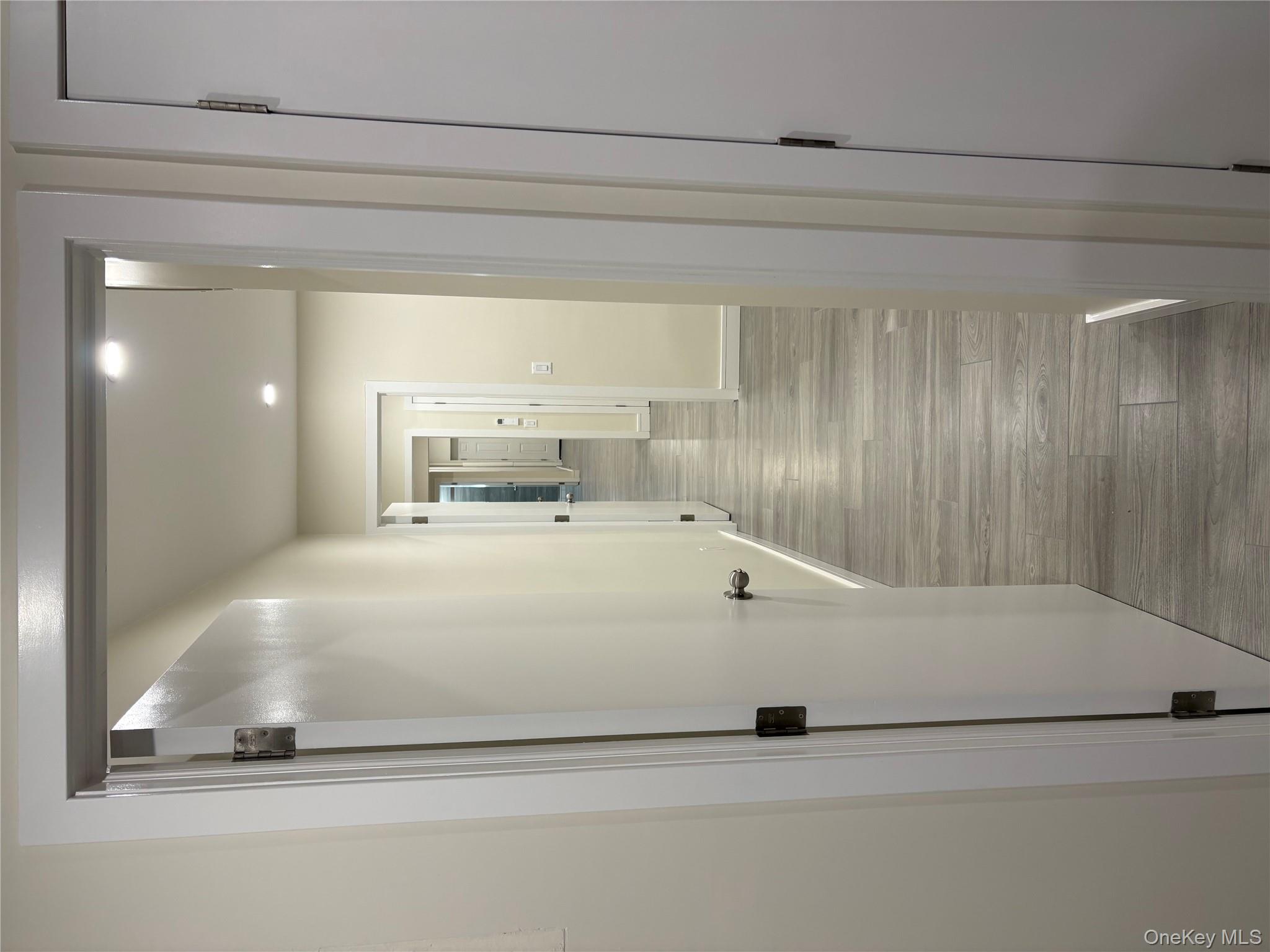 30-68 45th Street, Unit 1 Queens, NY 11103 - Photo 5 of 24 a view of a hallway