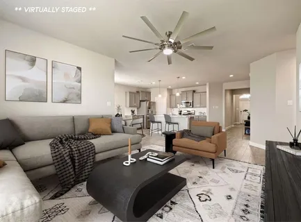 a large kitchen with a lot of counter space and stainless steel appliances