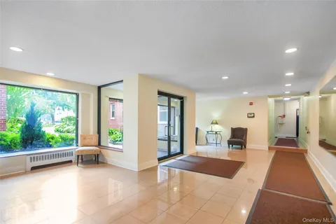 a large white room with a large window