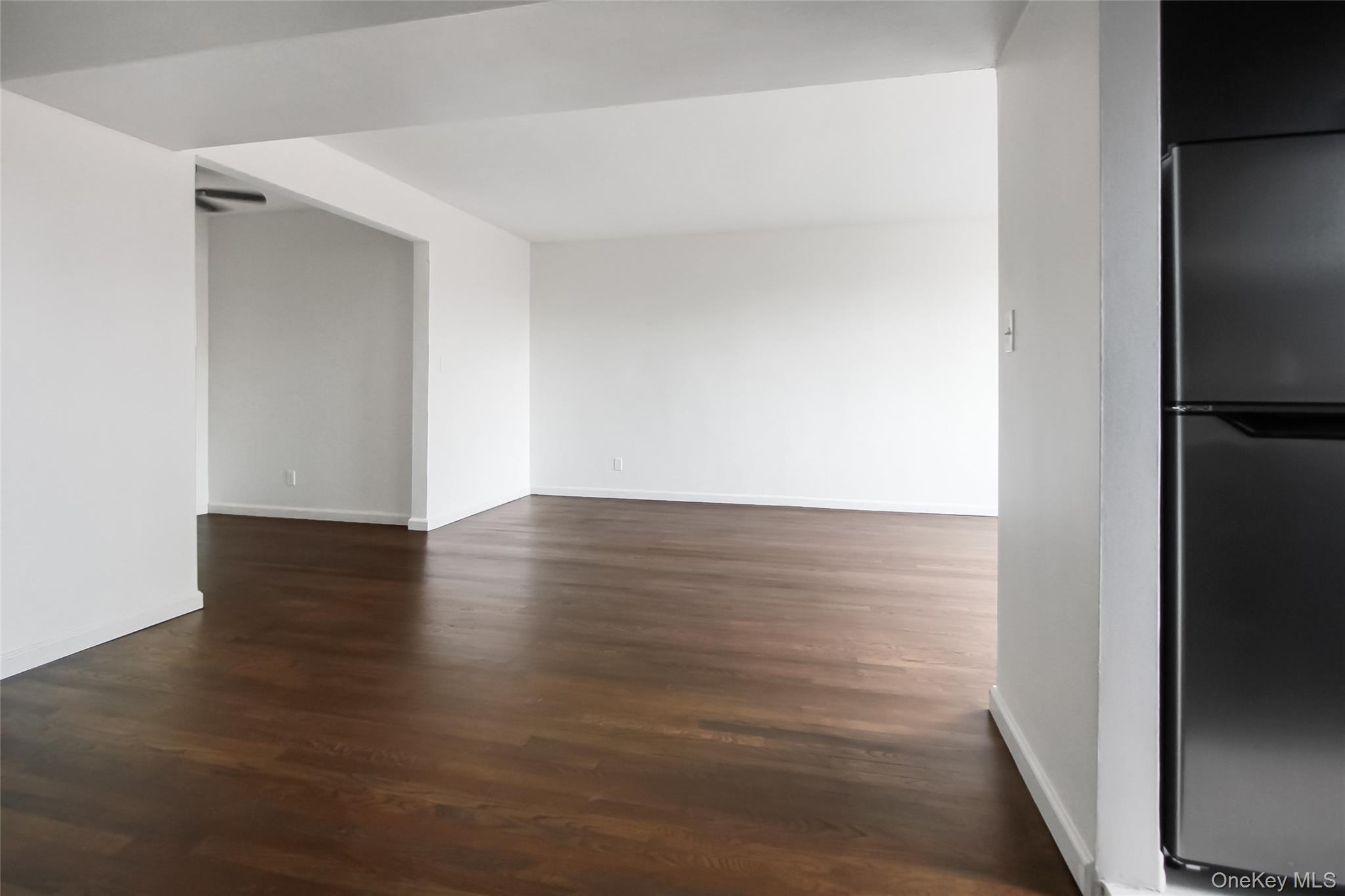 30 North Broadway, Unit 4C White Plains, NY 10601 - Photo 9 of 11 a view of room with wooden floor