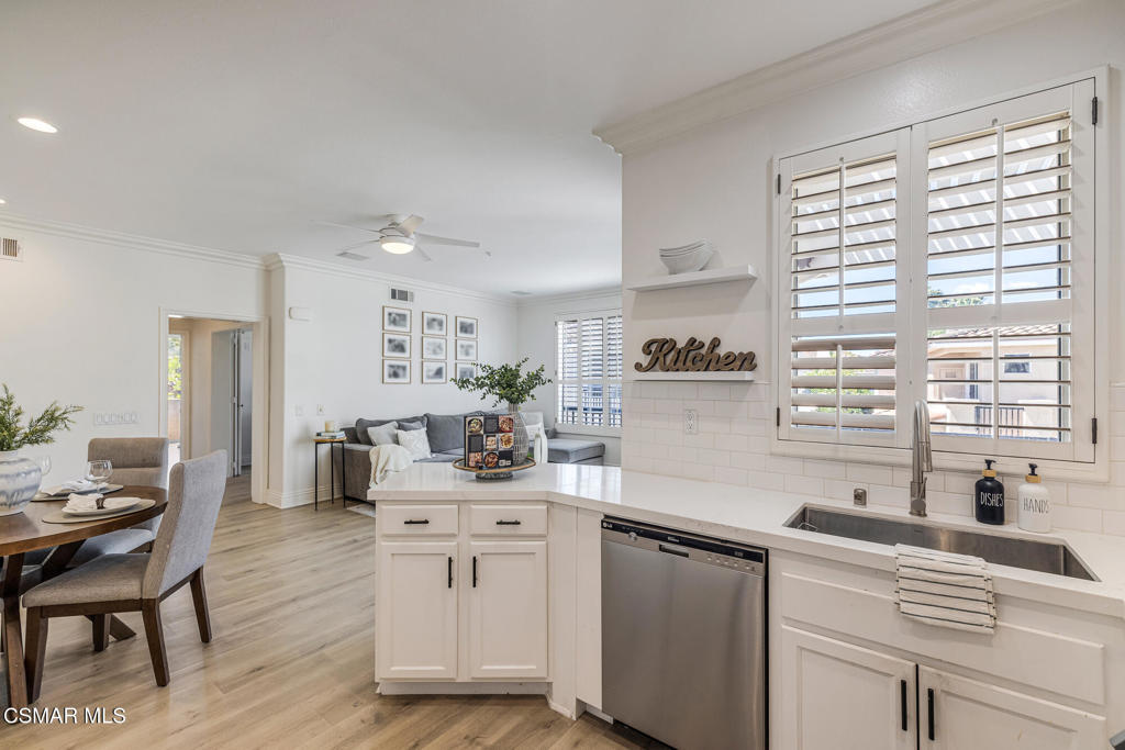 4038 Napoli Place Moorpark, CA 93021 - Photo 13 of 33 a kitchen with a sink cabinets and window