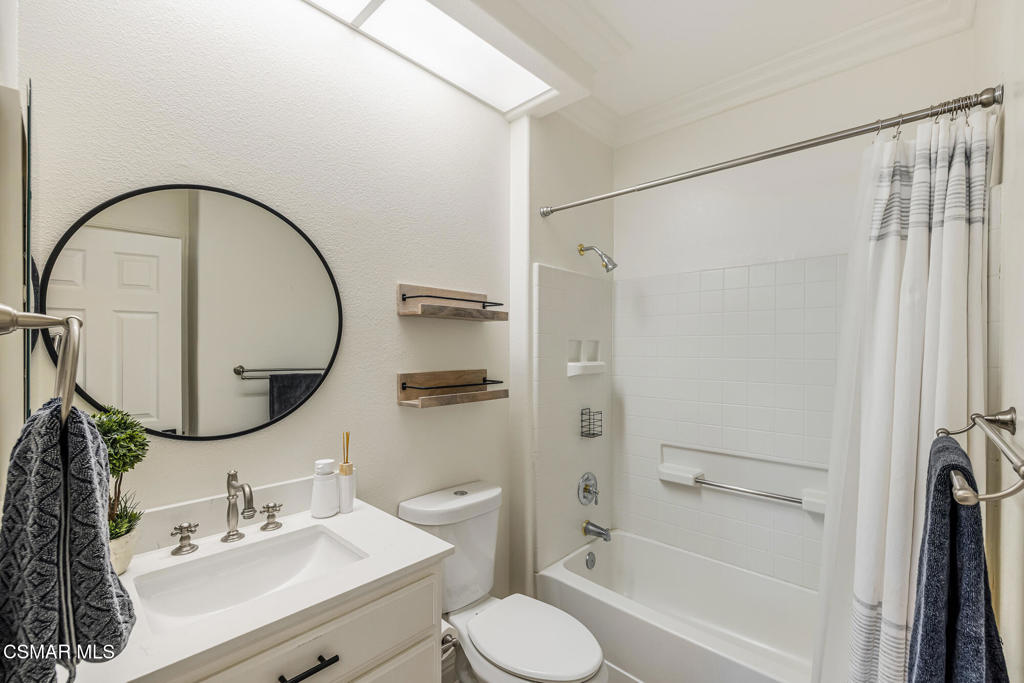 4038 Napoli Place Moorpark, CA 93021 - Photo 18 of 33 a bathroom with a sink toilet and shower