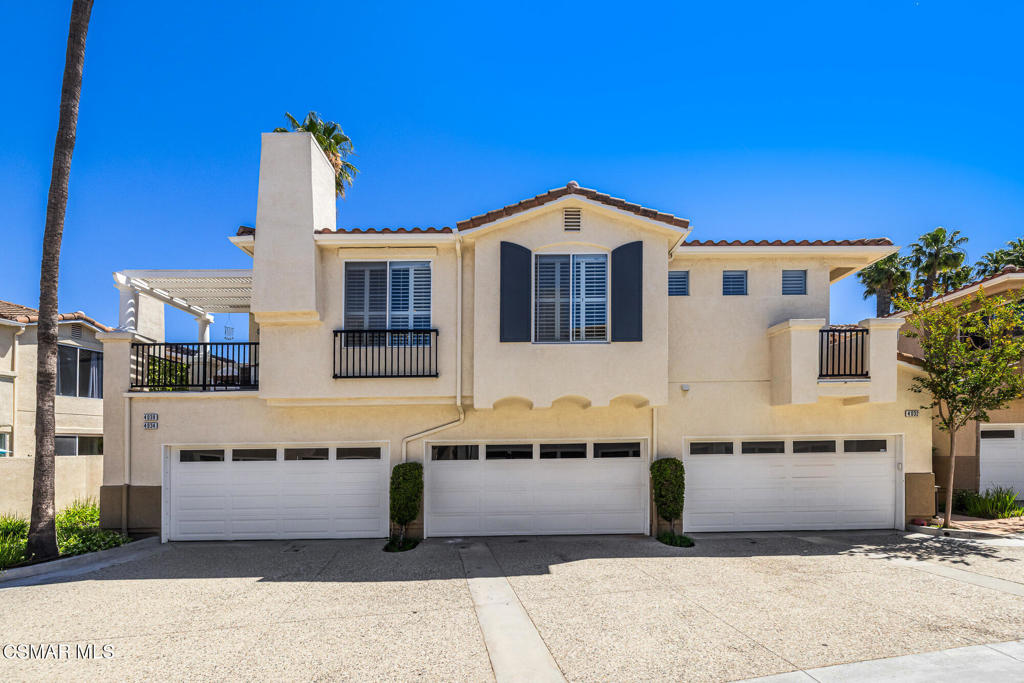 4038 Napoli Place Moorpark, CA 93021 - Photo 2 of 33 a front view of a house with a yard
