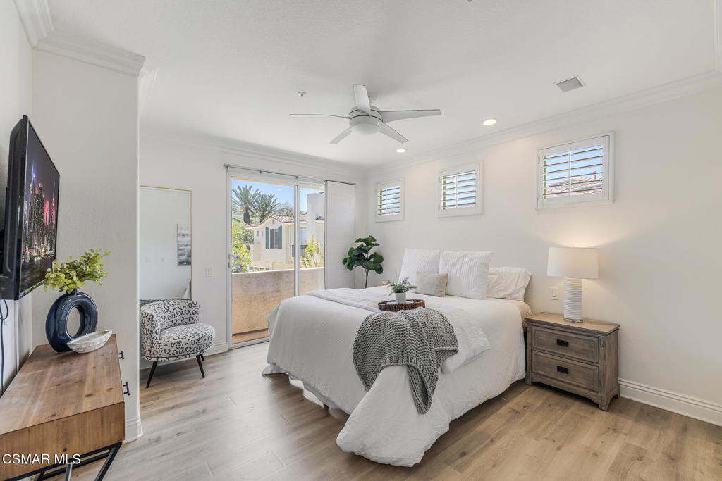 4038 Napoli Place Moorpark, CA 93021 - Photo 23 of 33 a bed room with a bed and a couch
