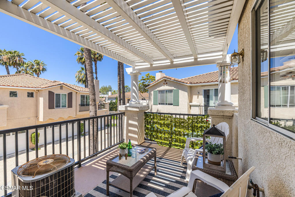 4038 Napoli Place Moorpark, CA 93021 - Photo 26 of 33 a view of a chair and table in the balcony