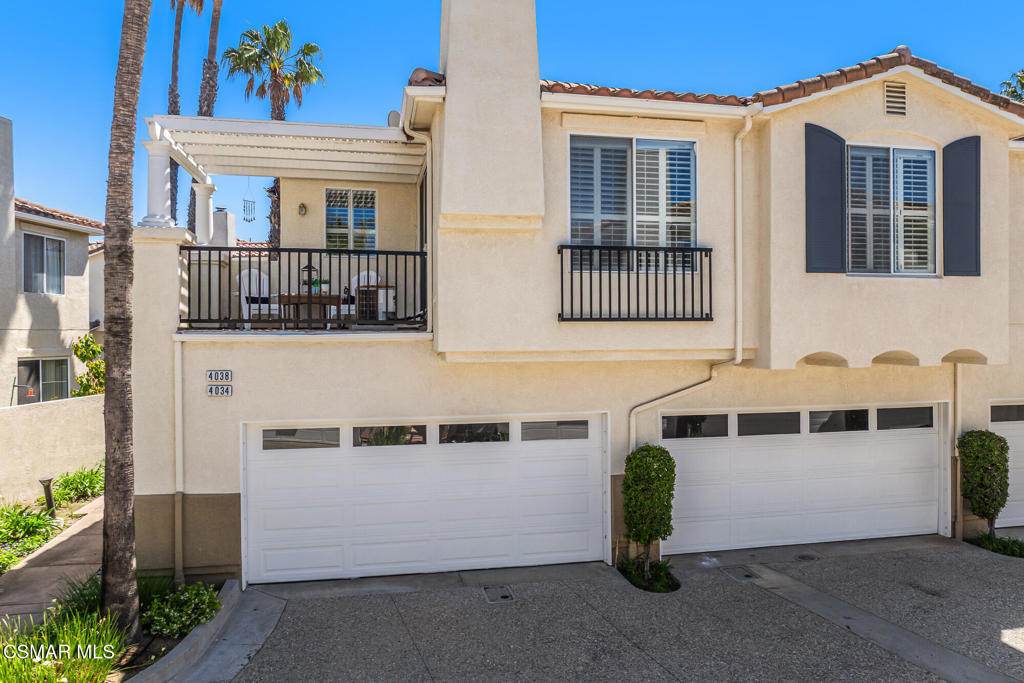 4038 Napoli Place Moorpark, CA 93021 - Photo 28 of 33 a front view of a house with large windows