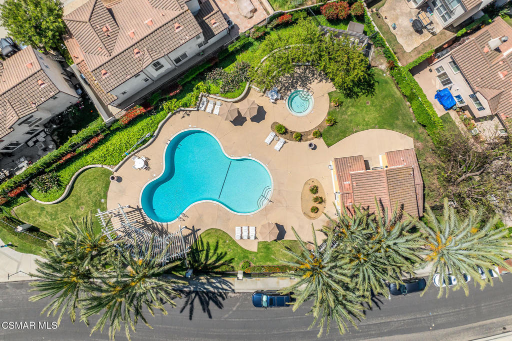 4038 Napoli Place Moorpark, CA 93021 - Photo 30 of 33 an aerial view of a swimming pool with a garden and plants