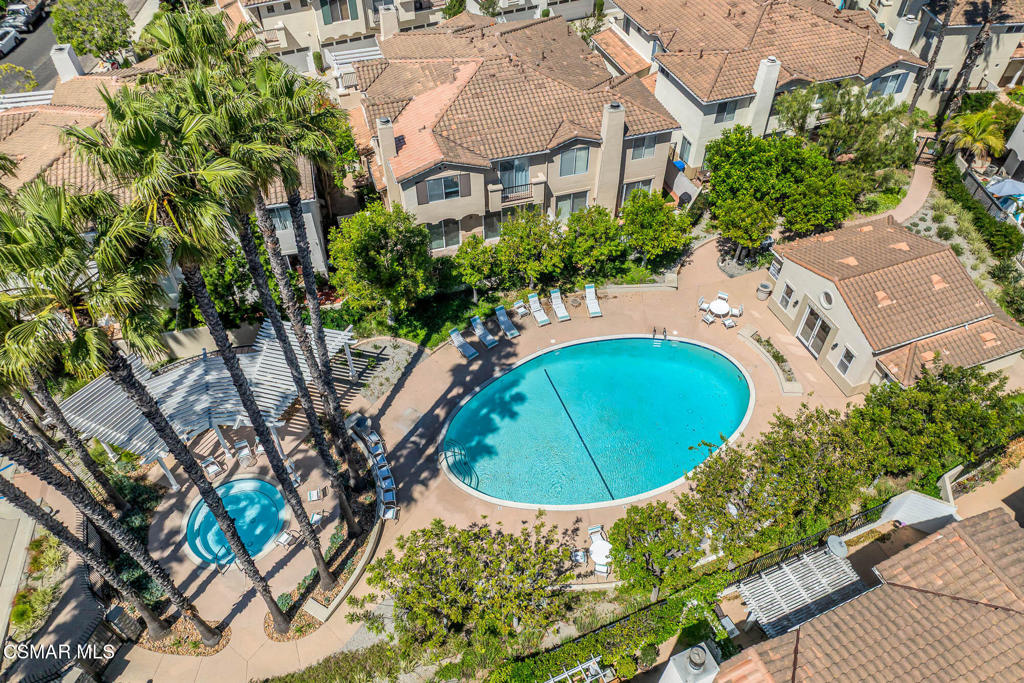 4038 Napoli Place Moorpark, CA 93021 - Photo 32 of 33 an aerial view of a house with a swimming pool and garden