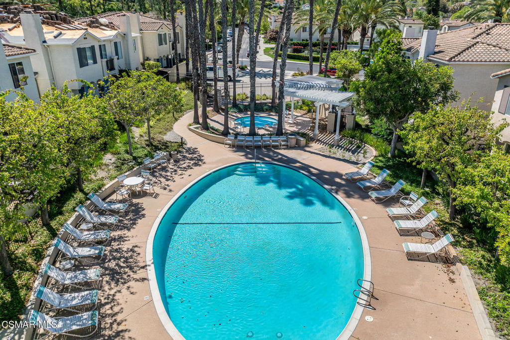 4038 Napoli Place Moorpark, CA 93021 - Photo 33 of 33 a view of a swimming pool with a patio