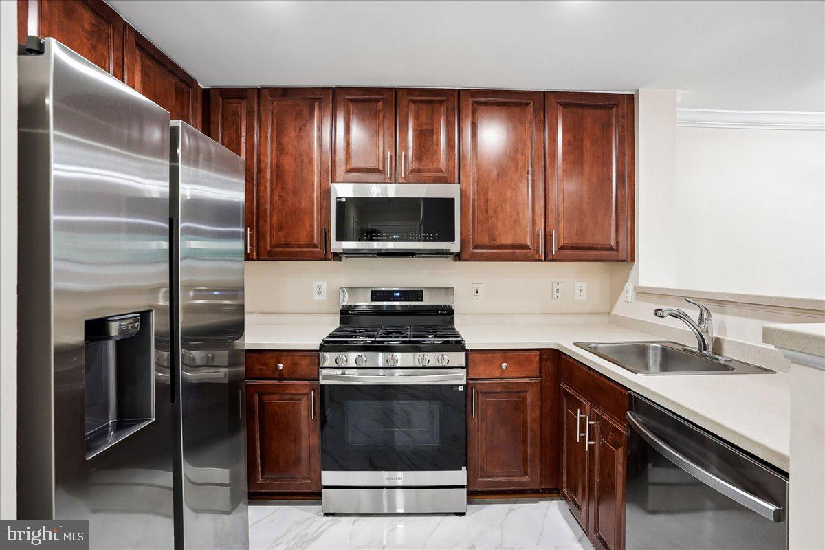 12001 Market Street, Unit T51 Reston, VA 20190 - Photo 5 of 62 Gleaming new stainless steel appliances