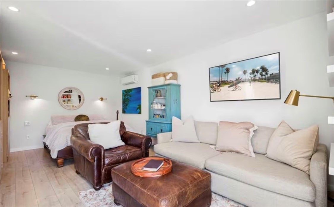 1550 B West Palais Road Anaheim, CA 92802 - Photo 6 of 8 a living room with furniture and a wooden floor