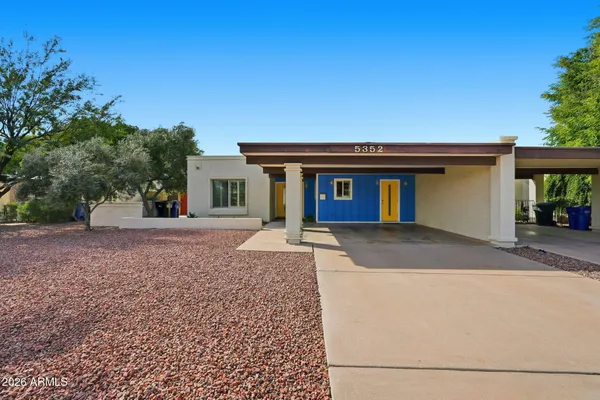 a house view with a outdoor space