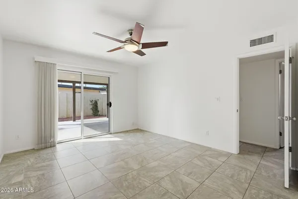 a view of an empty room with a window