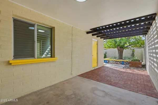a view of a house with porch and wooden floor