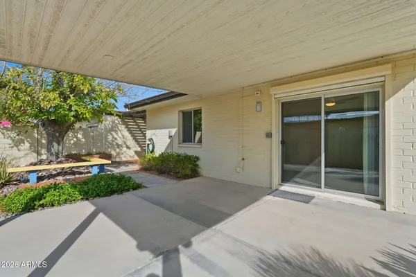 a house view with a backyard space