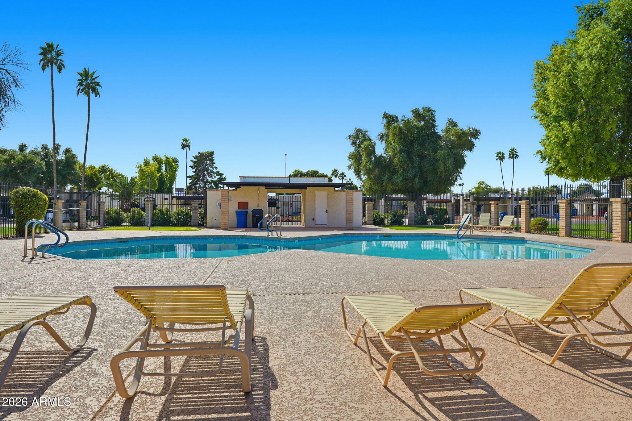 5352 South Country Club Way Tempe, AZ 85283 - Photo 31 of 42 a view of swimming pool with seating space