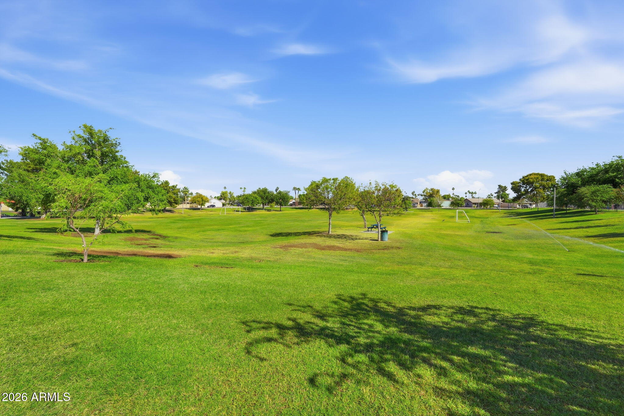 5352 South Country Club Way Tempe, AZ 85283 - Photo 33 of 42 a yard with lots of green space and trees in the background