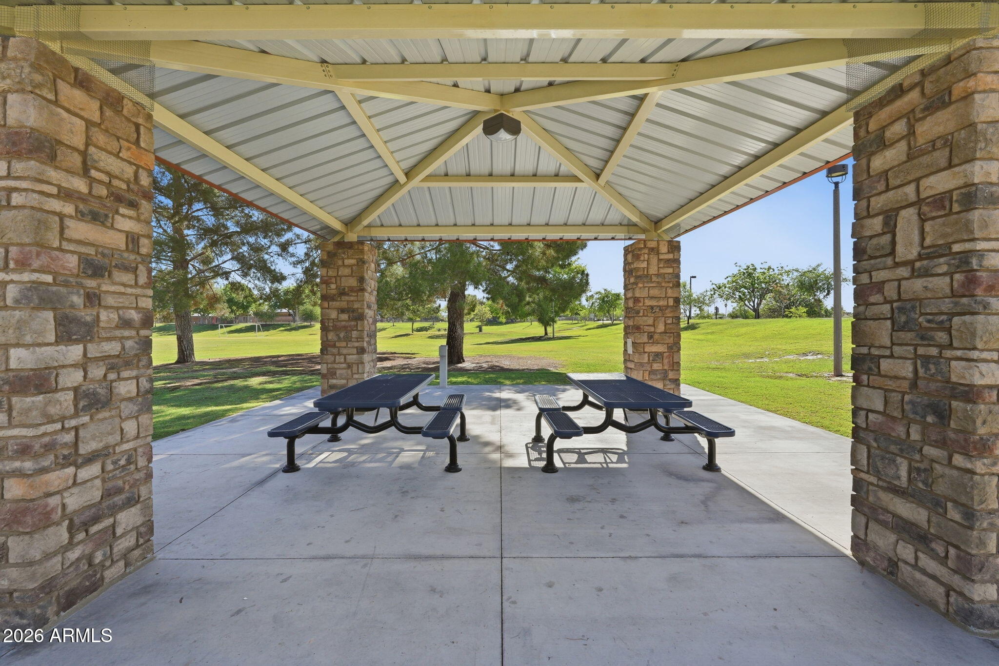 5352 South Country Club Way Tempe, AZ 85283 - Photo 37 of 42 a backyard of a house with outdoor seating