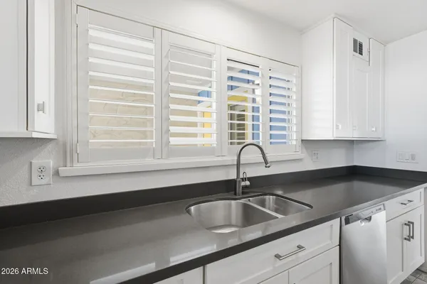 a close view of sink and a window