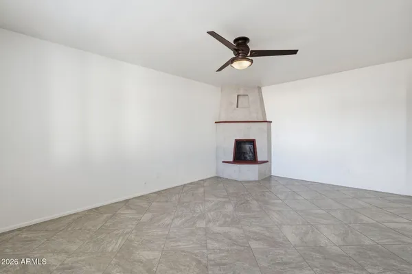 a kitchen with stainless steel appliances granite countertop a stove microwave and refrigerator