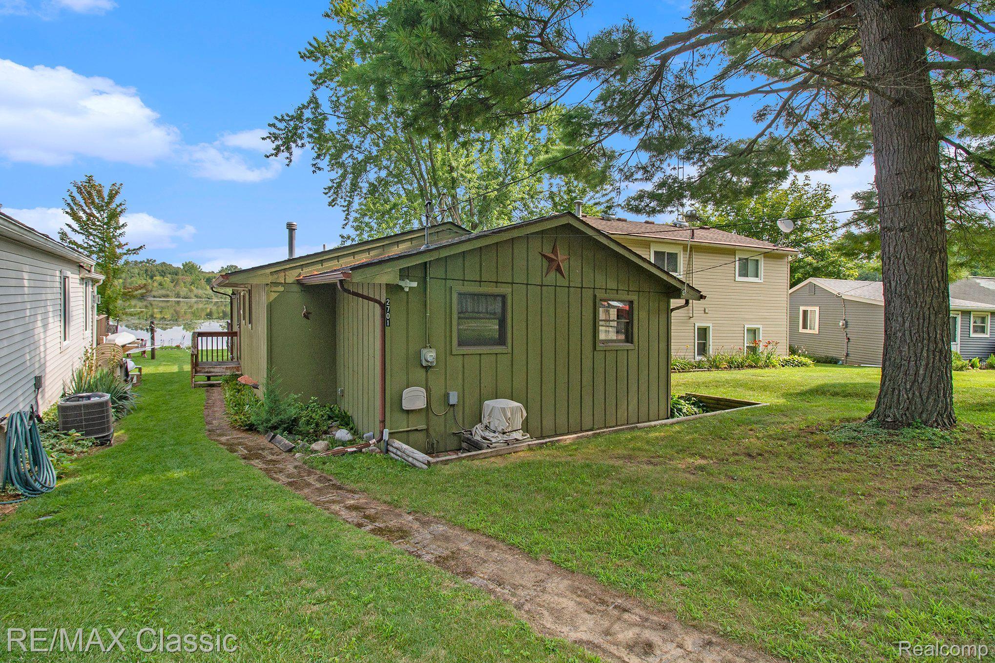 2701 Melvin Road Pinckney, MI 48169 - Photo 2 of 23 Ranch on Private All Sports Tioga. Lake