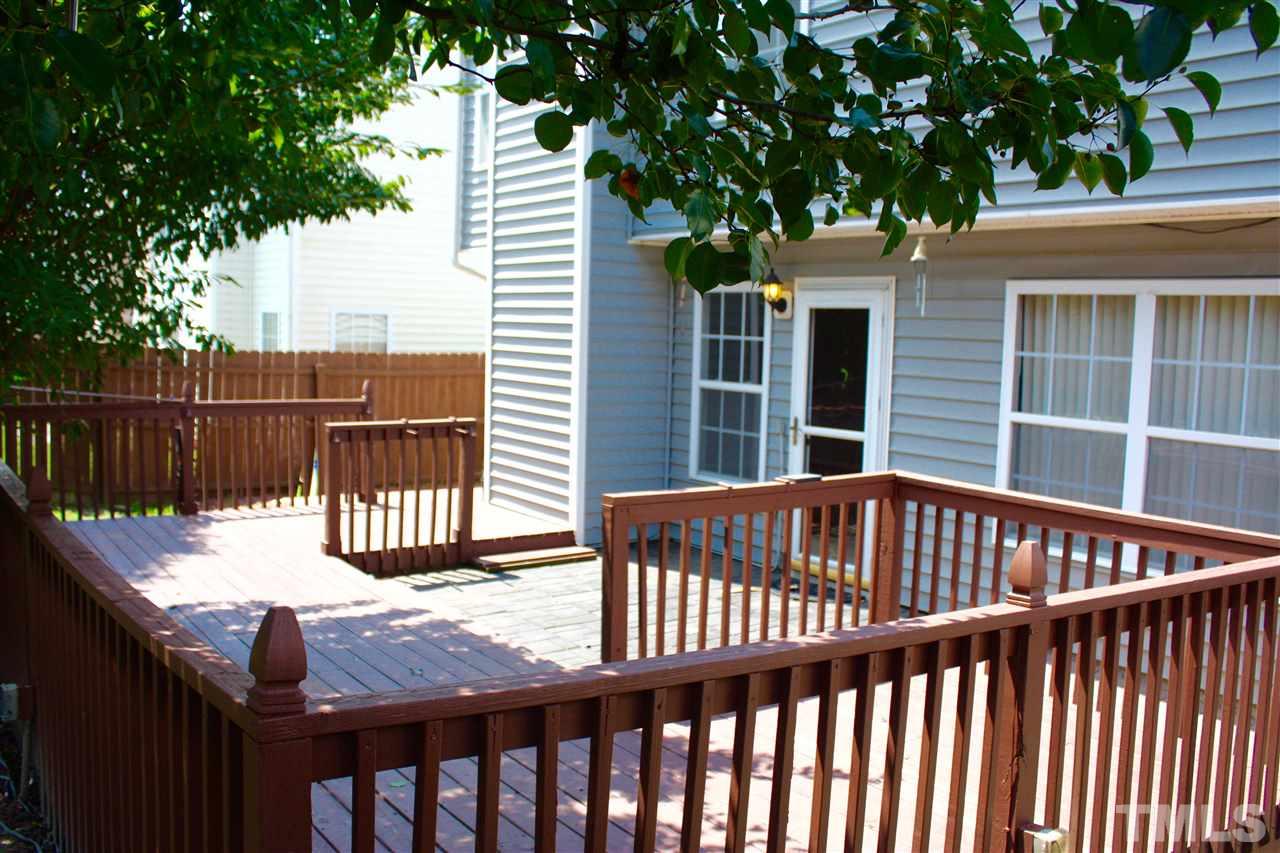 1515 Pebble Ridge Drive Raleigh, NC 27610 - Photo 5 of 17 Expansive deck-great for entertaining, and a fenced yard as well!