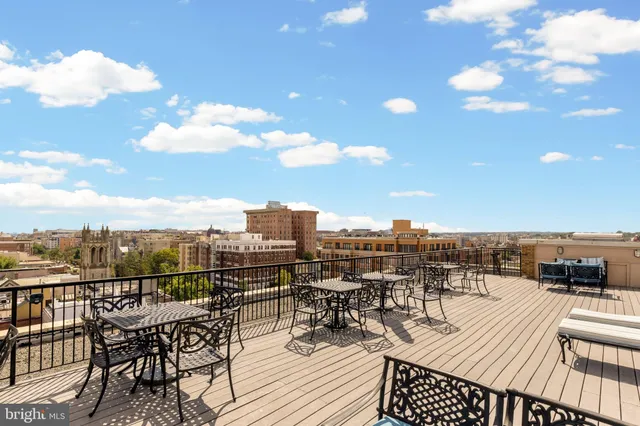 a view of a terrace with seating area