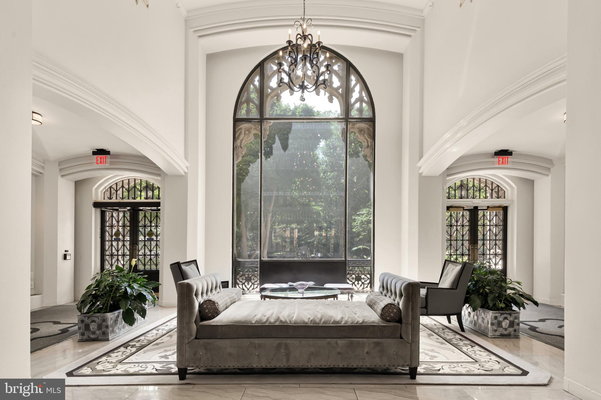1701 16th Street Northwest, Unit 822 Washington, DC 20009 - Photo 14 of 19 a living room with furniture and a window