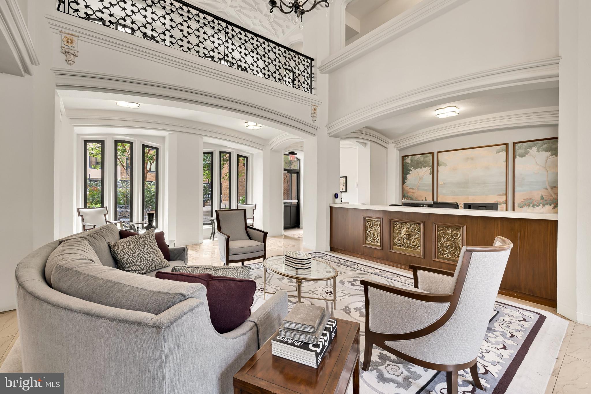 1701 16th Street Northwest, Unit 822 Washington, DC 20009 - Photo 15 of 19 a living room with furniture and a large window