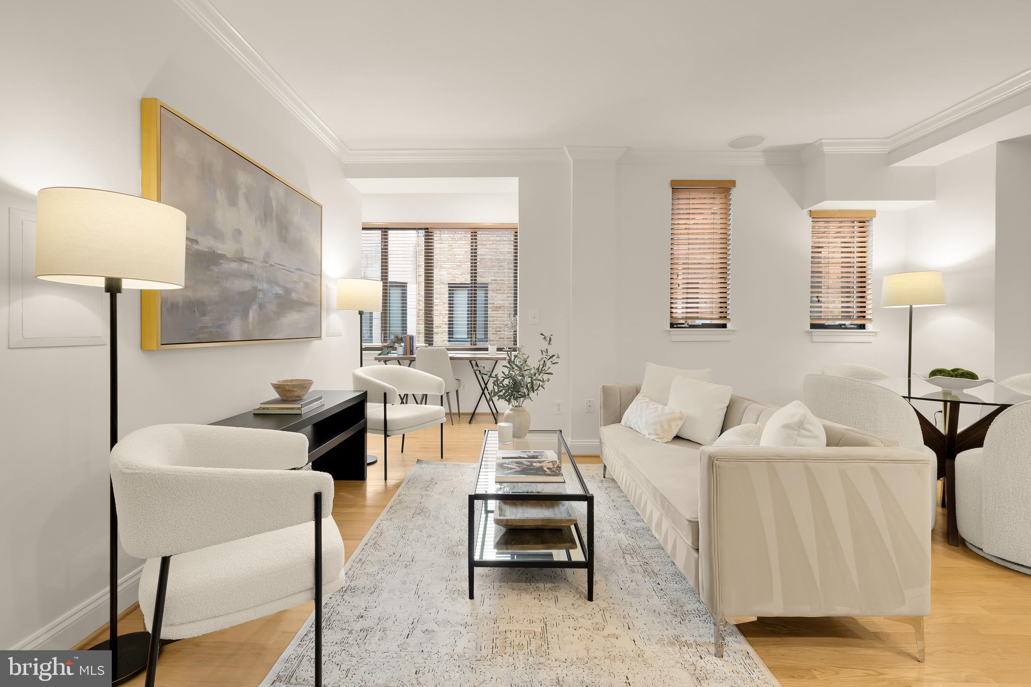 1701 16th Street Northwest, Unit 822 Washington, DC 20009 - Photo 7 of 19 a living room with furniture and a lamp