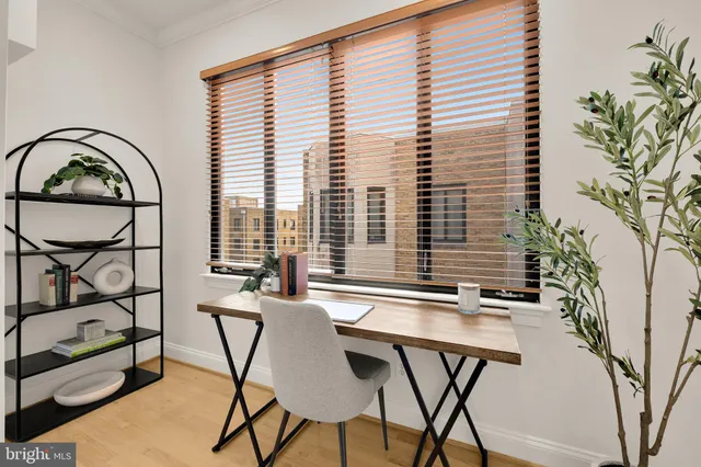 a view of a livingroom with furniture and window