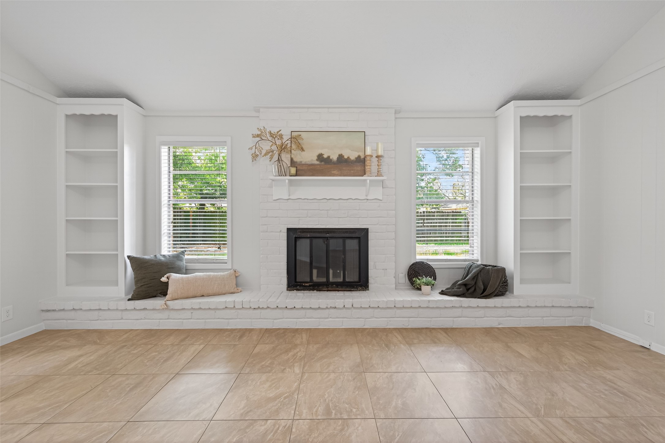 23919 Farm Hill Drive Spring, TX 77373 - Photo 12 of 41 a living room with furniture and a fireplace