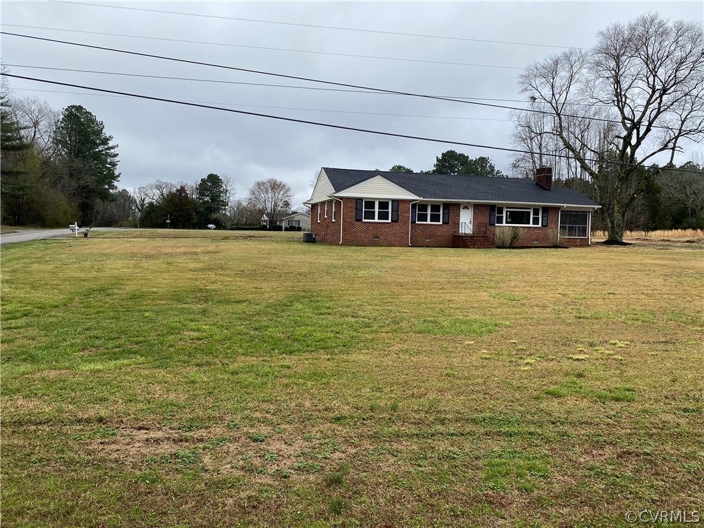 13462 Cabin Point Road Stony Creek, VA 23882 - Photo 28 of 30 a front view of a house with a yard