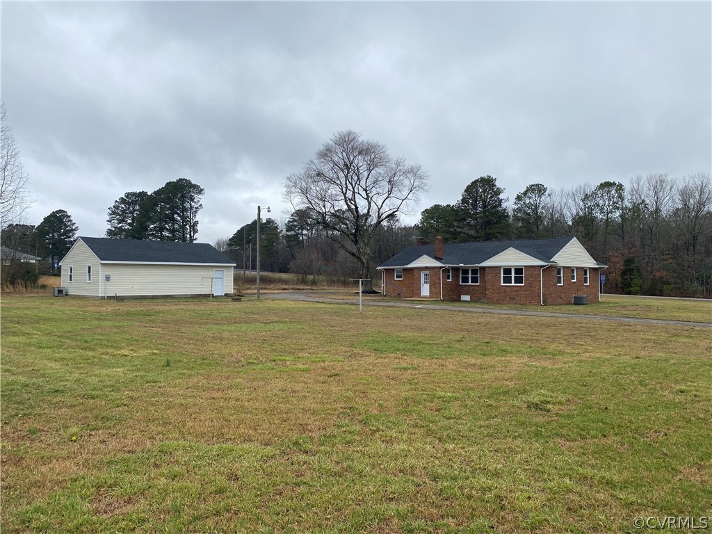 13462 Cabin Point Road Stony Creek, VA 23882 - Photo 29 of 30 a front view of a house with a yard