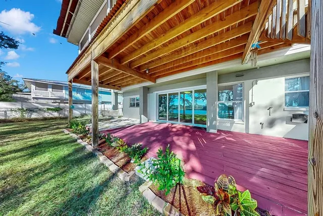 a view of room with window and ceiling fan